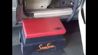 How a Mechanic Uses a Step Stool to Work on Automotive Interiors