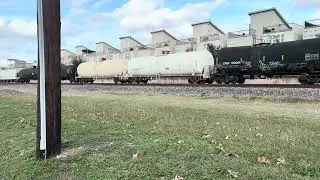 Union Pacific 2548 Leads while Union Pacific 8921 Trails Long Mixed Train.