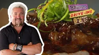 Guy Fieri Eats Adobo-Glazed Chicken Wings | Diners, Drive-Ins and Dives | Food Network