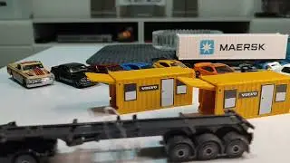 Diecast scale model - Majorette Volvo FMX construction container Mattel