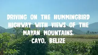 Driving on the Hummingbird Highway with views of the Mayan Mountains. Cayo, Belize