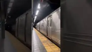 R46 n train arriving at Times Square w operator