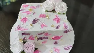 Square shaped lovely blueberry cake with cream roses