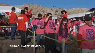 Families living both sides of U.S.-Mexico border embrace in emotional reunion