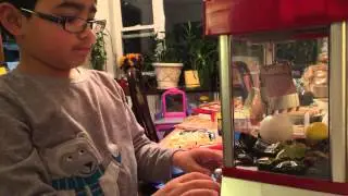 video: Sam playing the claw machine (22 sec.)