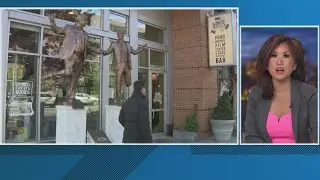 Trump - Epstein statue reappears outside DC bookstore