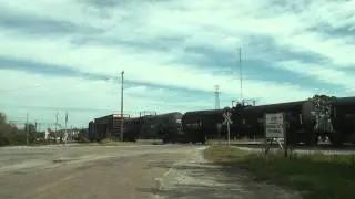 Bayline railroad manifest train drops off an empty load.