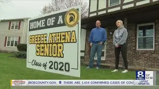 Greece Athena staff delivers signs to 2020 graduates