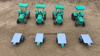 A trolley is standing there, filled with white clay! Green tractors have taken it away.#151 