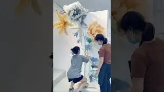 Giant flower paper flower for store decor.#giantflowers #eventdecor #florist #giantplants #floralart