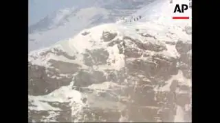 NATO troops reach crash site, search wreckage
