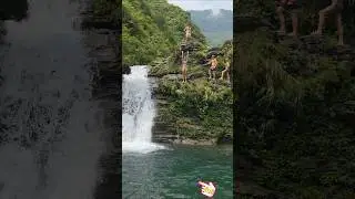 Dive and explore a beautiful waterfall in the rainforest #travel #waterfall