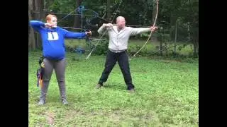Compound Bow and Japanese Longbow (Yumi) At Full Draw