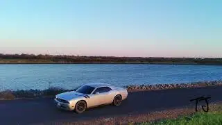 Driving A Dodge Challenger Through A Northern California Sunset