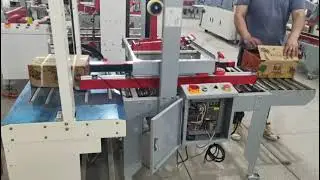 Combo Carton tapping with strapping machine