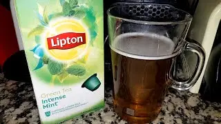 Lipton Green Tea Intense Mint capsules on a Nespresso Delonghi Inissia coffee machine