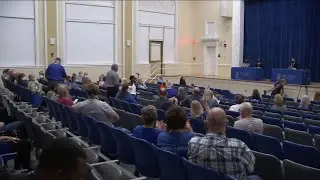 Emotions high at school name change meeting