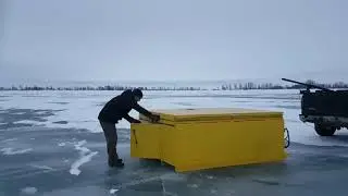Mark Deploying his ice shack from his truck