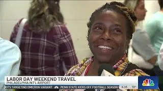People Line Up for Security Check on Busy Travel Day at Philadelphia Airport