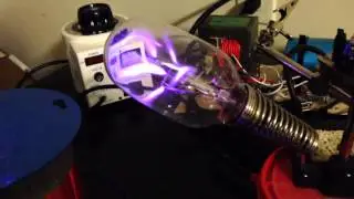 Lightbulb + Continuous Wave Tesla Coil
