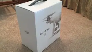 Bought a drone!  Unboxing the DJI Phantom 4 drone and taking it for a test flight.