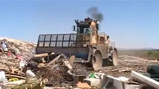 Caterpillar 836 Compactor And A D8T Dozer At the Republic Landfill In Apache Junction, Arizona