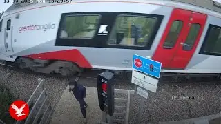 Teenager's terrifying near-miss with oncoming train captured on video