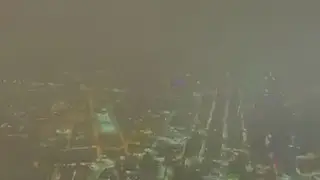 Aerial view of downtown Dallas winter wonderland after overnight snowfall
