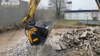Steine brechen an einem Minibagger mit dem MB-L140