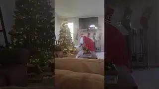 My kid catching Santa