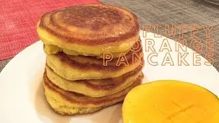 Fluffy Orange Pancakes with freshly squeezed orange juice (banana milk or coconut cream)