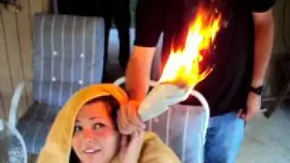 Newspaper fire to ear trick!