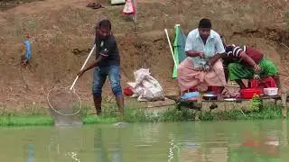 A monster size catla fish catching using fishing rod