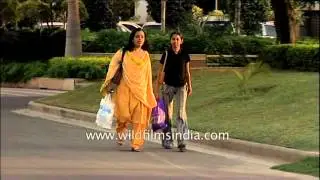 Urban India City life: office-goes, sanitation workers, office buildings, traffic,
