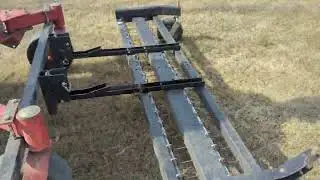 Dethatching with JRCO front mounted tine rake. Toro Grandstand