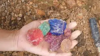 Red crystals are formed in volcanic rock veins. Sapphire, turquoise, agate
