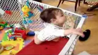 Dylan climbs the ZipBin toybox