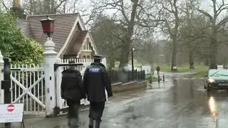Police at entrance to Royal Lodge, former home of ex-Prince Andrew | AFP