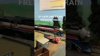 Southern pacific 4449 American Freedom Train hauling a Amtrak express train.