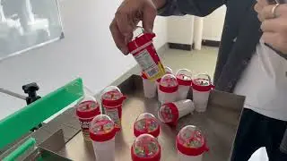 Conical round snack cup bottle automatic label applicator