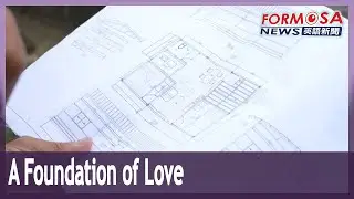Volunteers build homes for families in need