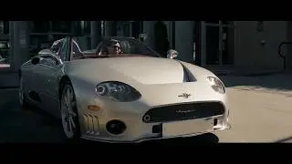 Rogue is driving away on Spyker C8 Spyder (