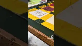 Tacking a t-shirt quilt country style