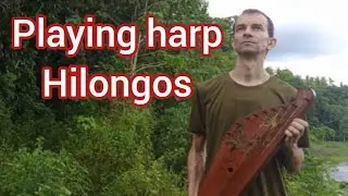 Playing harp in Hilongos Leyte 