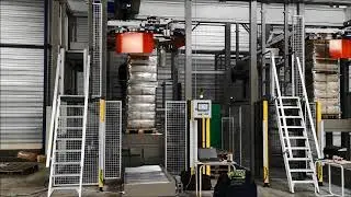 Palletiser met ge&iuml;ntegreerde pallet wikkelaar