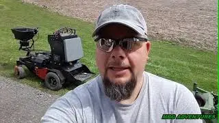 Yard Tuff power spreader on a Exmark Z Aerate 24 Inch
