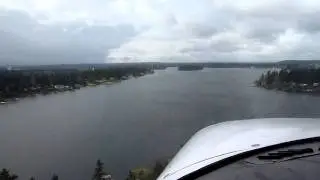 Cessna 182 seaplane 212CC landing on American Lake, WA.