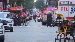 Five people, including police officer and gunman, killed in Manhattan office shooting
