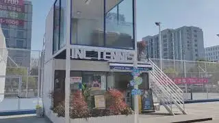 An Outdoor Double-Decker Tennis Promotion Booth.