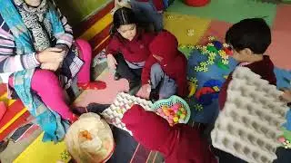 Play school in motion. Fine motor skills eventually help in pencil holding.